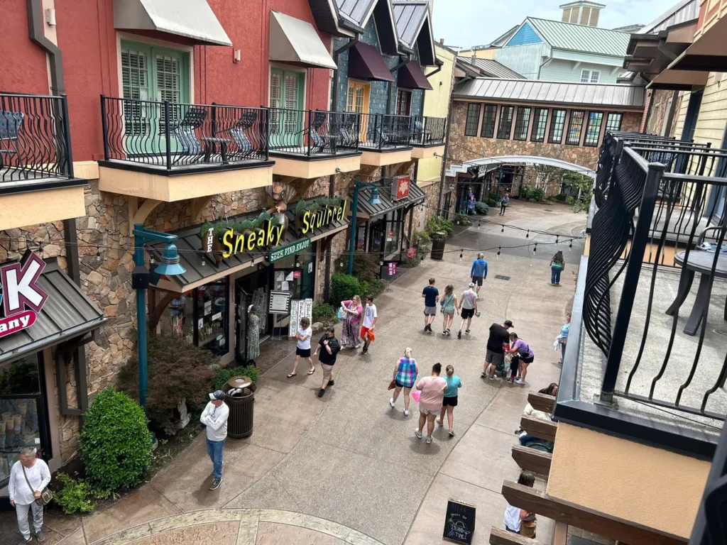 View from our room at the Margaritaville Resort, showing the shops at The Island in Pigeon Forge, Tennessee. Looking out from a resort balcony at the shops and paths of The Island during a gatlinburg-pigeon-forge-vacation.