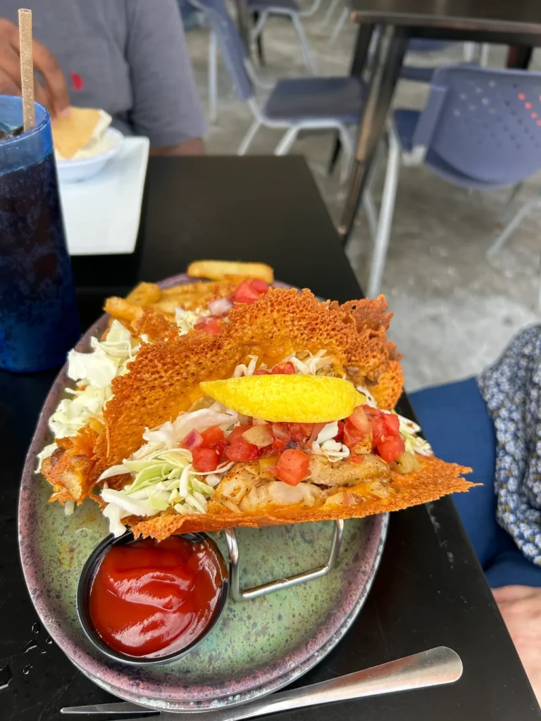 A massive portion of fresh grouper fish tacos served at the Ugly Grouper, a must-visit among sarasota-bradenton-restaurants.