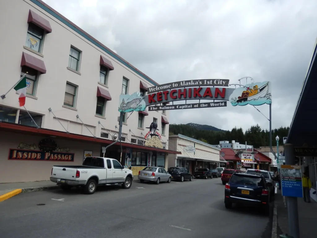 The famous historic "Welcome to Alaska's 1st City Ketchikan" sign spanning the street on an alaskan-cruise-adventure.
