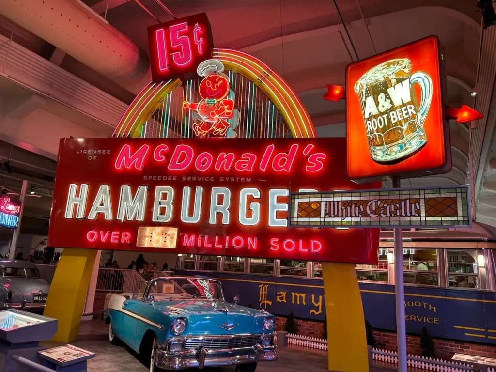 Take a walk down memory lane with vintage signage. The original McDonald's sign on display features a single arch. A piece of vintage roadside Americana featuring an original single-arch McDonald's sign at the Henry Ford Museum Detroit.