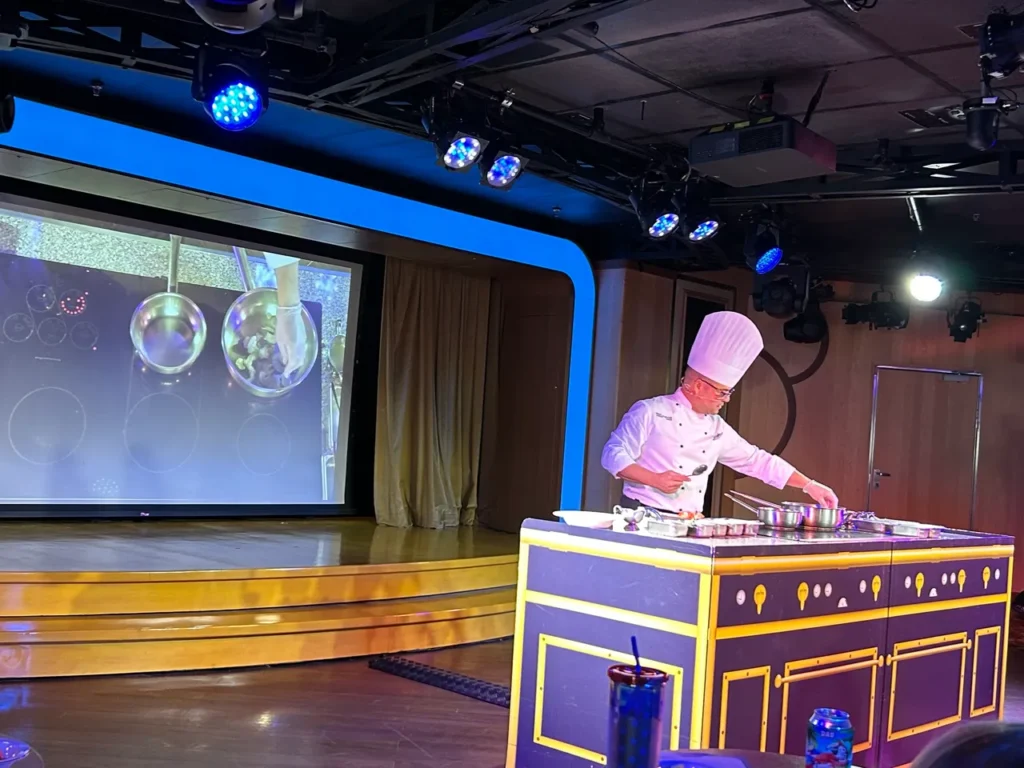 Cooking classes can range from on board talent to guest chefs. We were treated to the talents of Axel Martinez, the chef at Disney's Hollywood Brown Derby. An onboard cooking destination demonstration class led by a guest chef from Disney's Hollywood Brown Derby during a Disney cruise for adults.