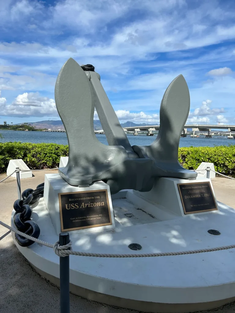 As you stroll around the park, make sure you visit the original anchor for the USS Arizona. The original historic anchor from the USS Arizona on display on the park grounds of the Pearl Harbor Memorial Hawaii.
