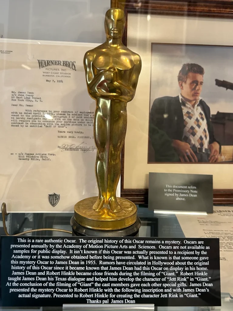 Though he never won an Oscar, James Dean somehow came into possession of one. He gave away the authentic Oscar to friend and acting coach Robert HInkle while working on the movie Giant. An authentic golden Oscar trophy on display alongside historic Warner Bros. contract documents at the James Dean Museum in Indiana.