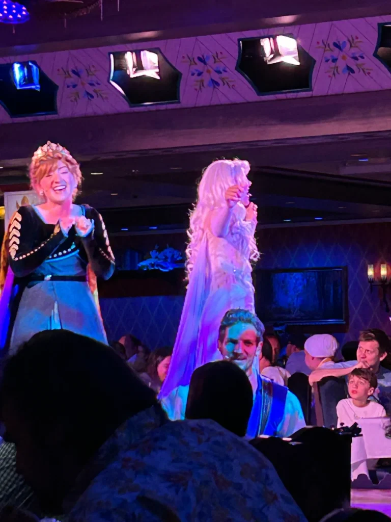 The live Frozen show theatrical performance at the Arendelle restaurant featured in our Disney Wish dining guide.
