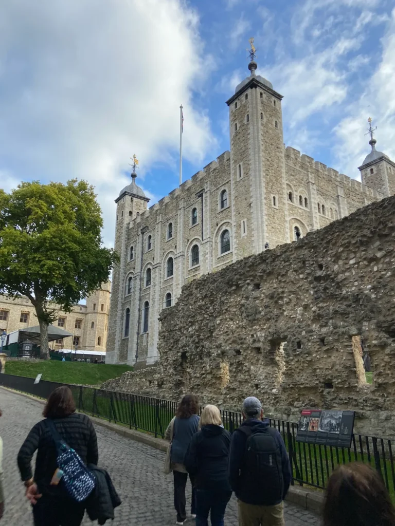 A section of the Roman wall built around AD200 to protect the city of London stands in front of White Tower. The White Tower was the first section of the Tower of London built, dating back to AD1066. The ancient ruins of a stone Roman wall dating back to AD200 standing in front of the White Tower at the Tower of London planning guide site.