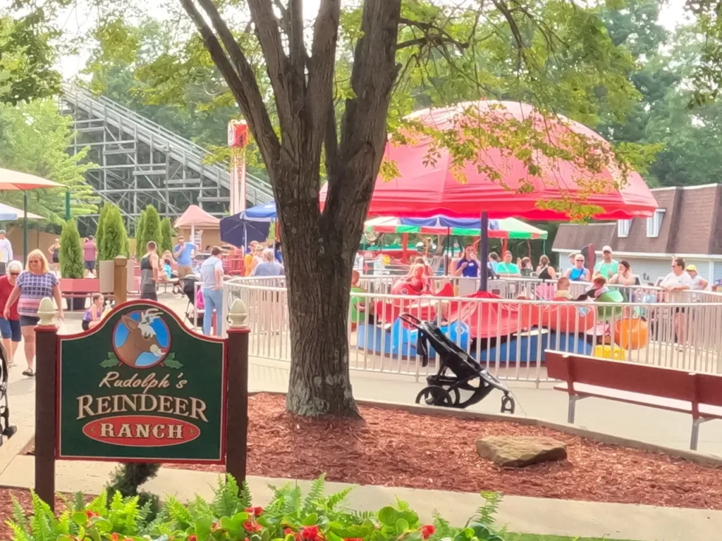 Holiday World has something for all ages, including little kids. In addition to the Holidog Funtown section, you can stop off at Rudolph's Reindeer Ranch. The colorful Rudolph’s Reindeer Ranch section sign for kids at Holiday World Santa Claus Indiana.