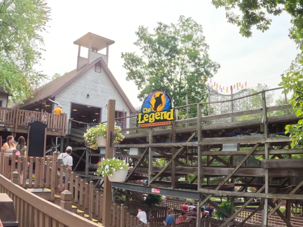 Holiday World has a world class reputation for their wooden roller coasters. They have three of the top ranked coasters in the world, including The Legend located in the Halloween themed section of the park. The massive wooden structure and station house of The Legend roller coaster in the Halloween section of Holiday World Santa Claus Indiana.