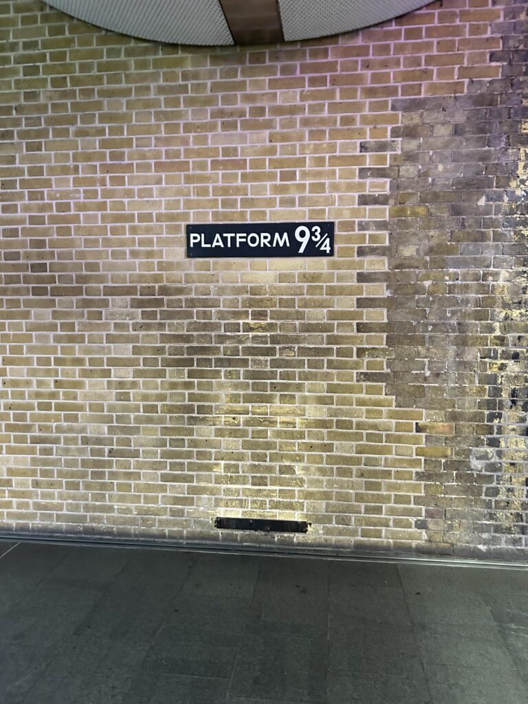 Though not the actual place it was filmed, visitor’s to King’s Cross can get their photo taken at Platform 9 3/4 while checking out the gift shops too. The famous Platform 9 3/4 photo spot and sign at King's Cross Station, featured in our LNER first class London to Edinburgh travel review.