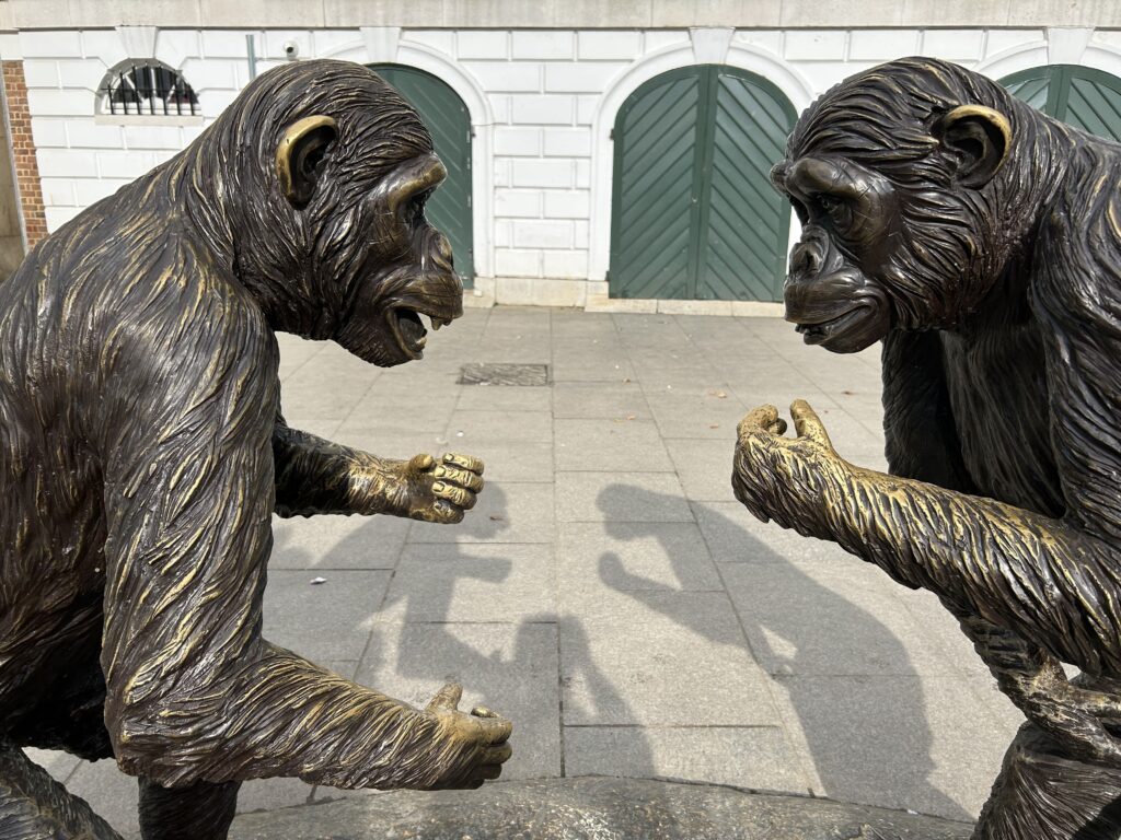 Chimps are Family art exhibit in Richmond UK A close-up view of the bronze "Chimps are Family" public art statues by Gillie and Marc, featured in our Richmond England Ted Lasso walking guide.
