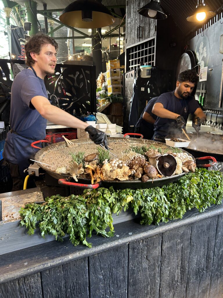Wild mushroom risotto at Borough Market, London A giant skillet of fresh wild mushroom risotto topped with truffle oil and parmesan cheese at London's Borough Market, a top food destination.