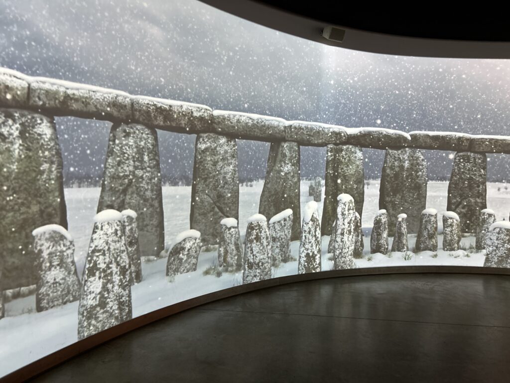 The virtual Stonehenge experience at the visitor's center gives you the opportunity to see Stonehenge during all four seasons of the year. The indoor virtual Stonehenge experience display inside the visitor's center on a Stonehenge vacation itinerary tour.