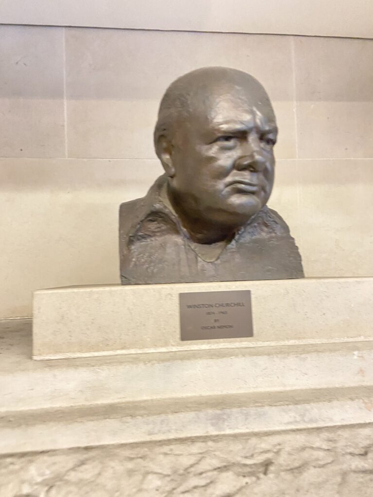 Winston Churchill statue on display at the Churchill War Rooms in London A historic bronze bust monument of Sir Winston Churchill featured in our Winston Churchill across England travel guide.