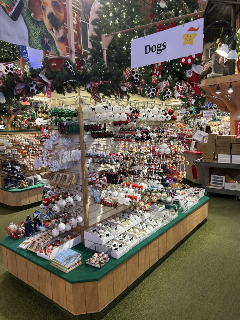 Bronner’s has over 6,000 styles of Christmas ornaments in stock. Nearly every imaginable dog breed has at least one ornament available for your tree. Rows of diverse dog breed Christmas ornaments neatly displayed on shelves inside Bronner's Christmas Wonderland during a Frankenmuth Michigan Christmas vacation.