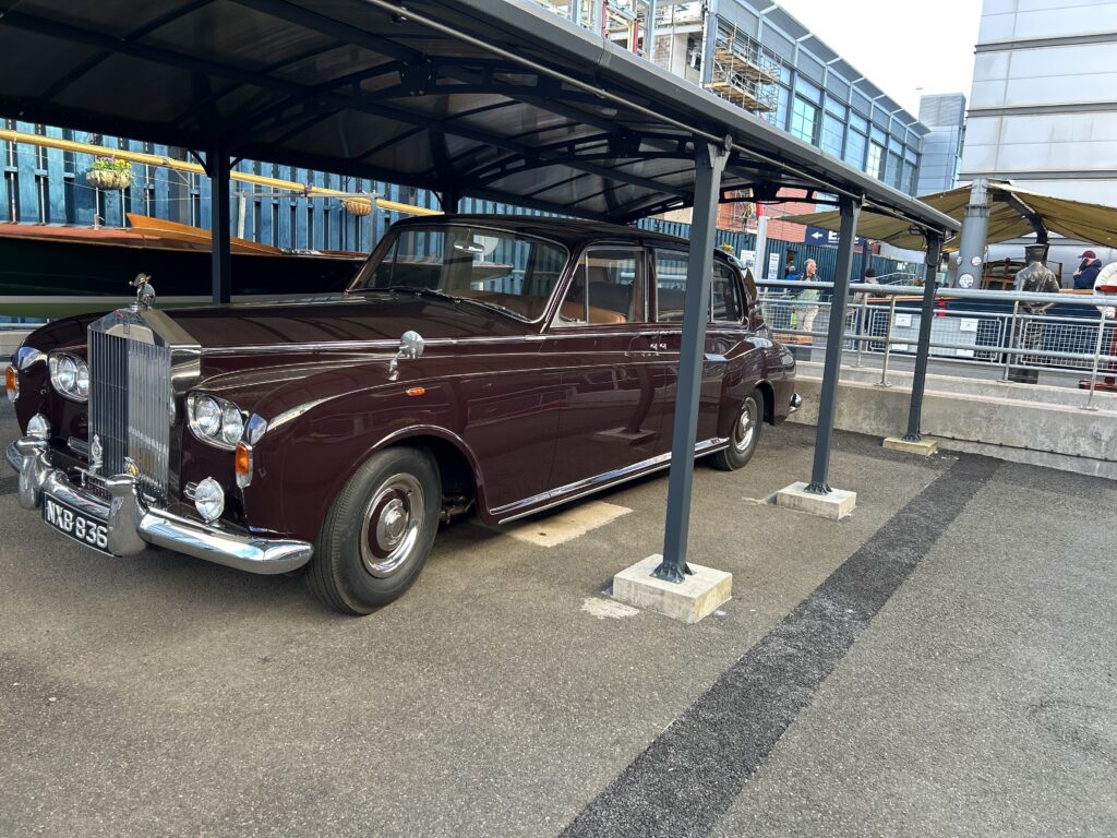 The Royal Family truly traveled in style when they were on Britannia. That extended to when they were on land too, including the Land Rover and Rolls-Royce that came along their travels. The classic Rolls-Royce Phantom V state car on display at the wharf of the Royal Yacht Britannia Edinburgh.