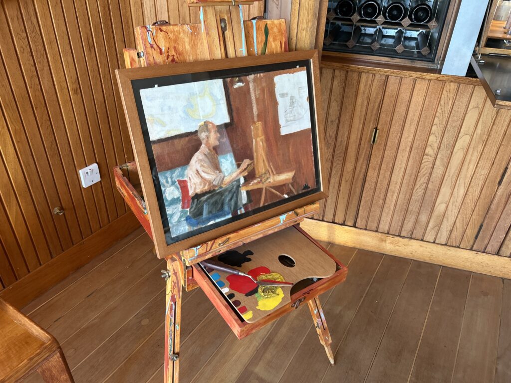 The wood paneled Sun Lounge was a favorite spot for both Queen Elizabeth and Prince Philip aboard the Royal Yacht Britannia. Prince Philip's painting easel inside the wood-paneled Sun Lounge on board the Royal Yacht Britannia Edinburgh.