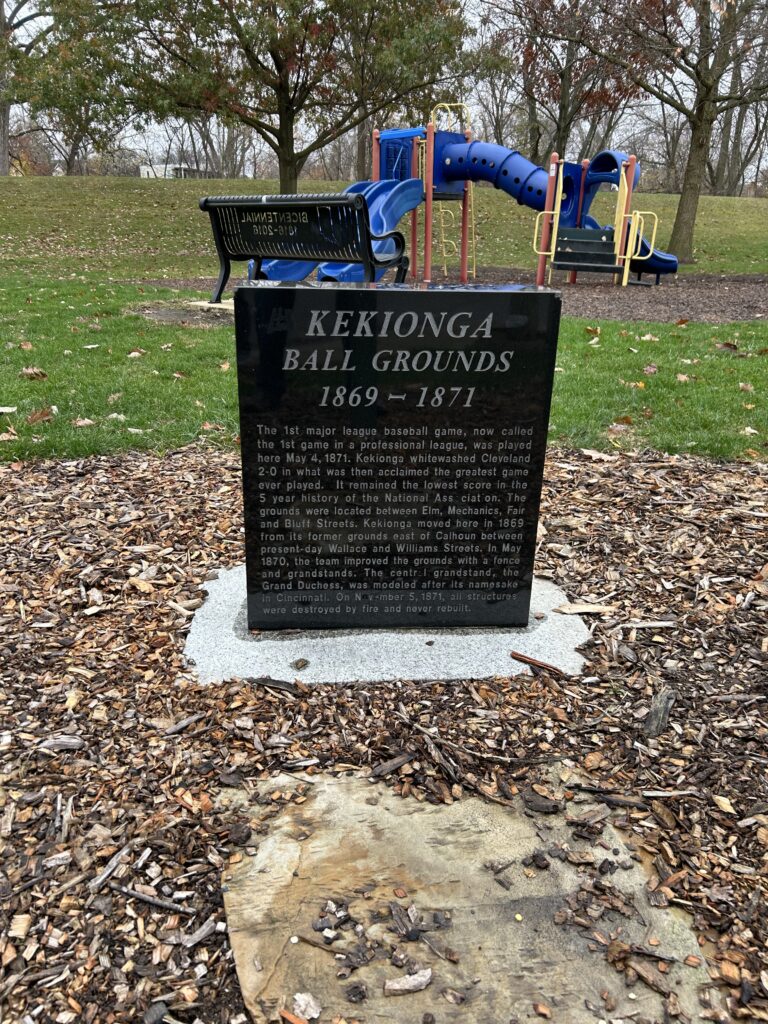 The site of the first game of the modern day Major League Baseball is now a small city park in Fort Wayne, Indiana. No remnants of a baseball diamond remains, only this small monument with details of the game. The historic stone monument at Camp Allen marking the site of the first game, solidifying Fort Wayne birthplace of Major League Baseball history.