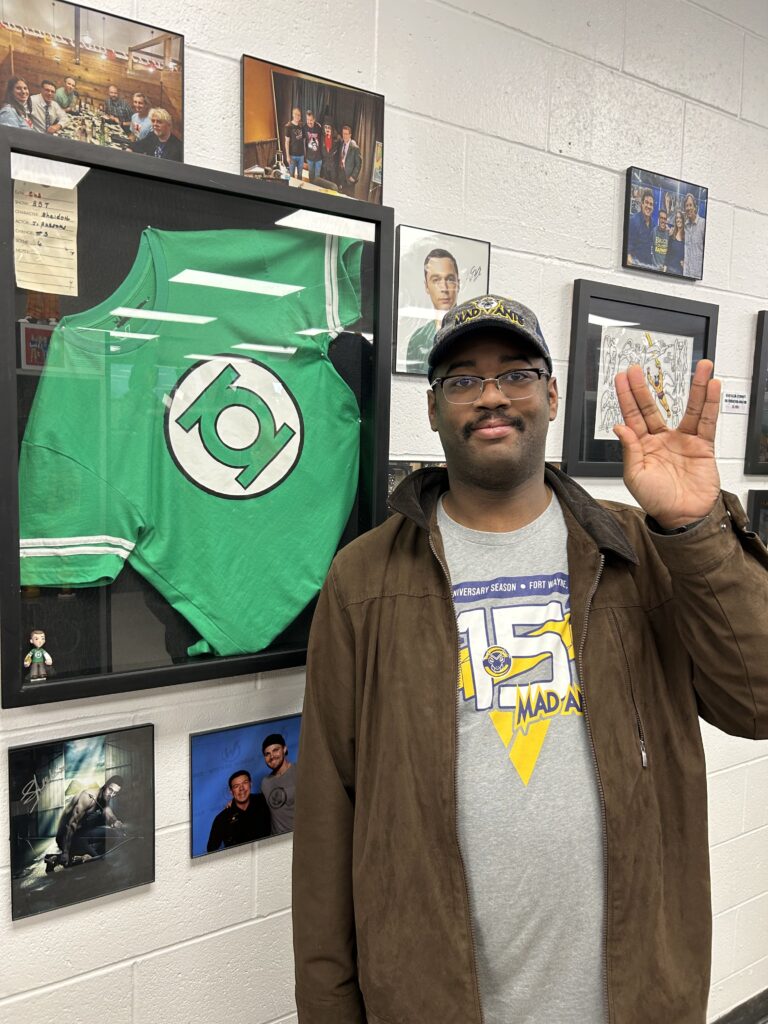 Sheldon Cooper's Green Lantern shirt from the popular TV show Big Bang Theory is on display at the Hall of Heroes in Elkhart, Indiana. Jim Parsons' autographed Sheldon Cooper Green Lantern shirt from The Big Bang Theory on display at the Hall of Heroes Elkhart Indiana.