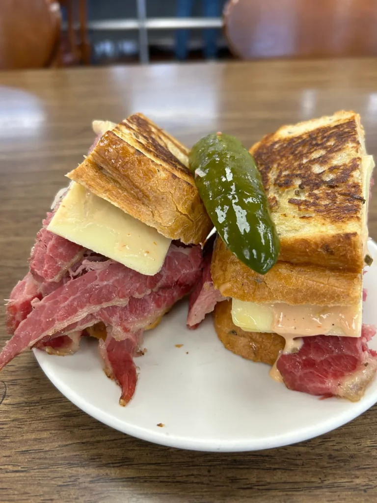Famous reuben sandwich in Indianapolis from Shapiro’s A massive, freshly sliced corned beef Reuben sandwich served with a kosher dill pickle spear at Shapiro's Deli Indianapolis.