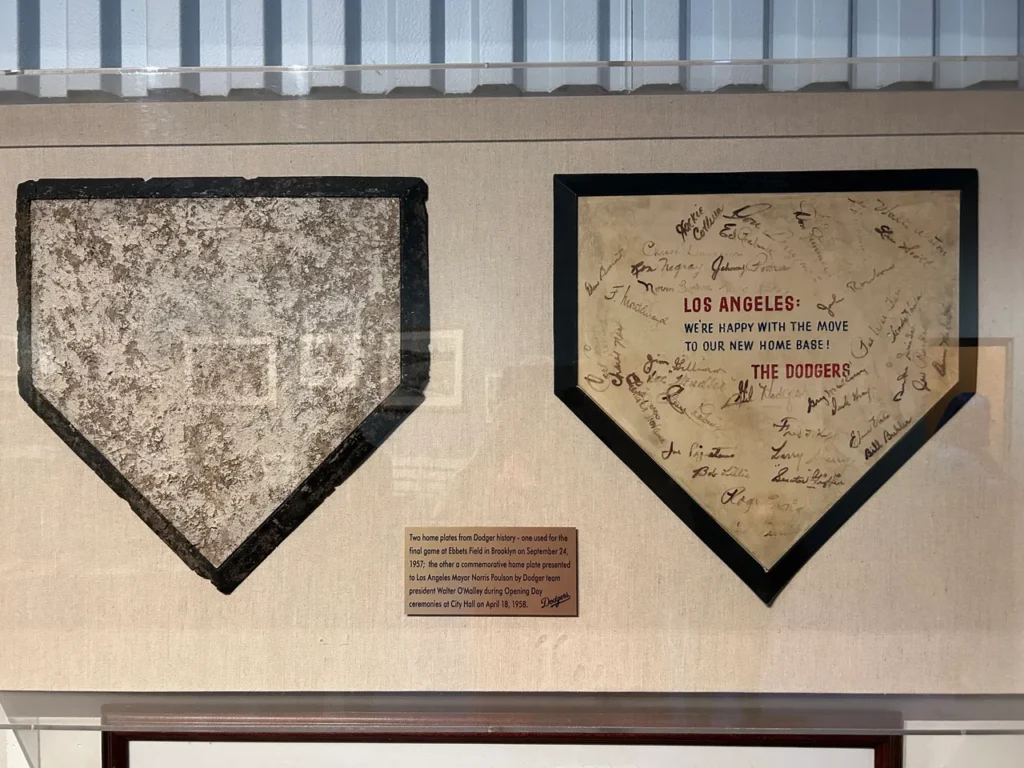 The last and first home plates of the Dodgers. On the left is the last home plate taken from Brooklyn's famous Ebbett's Field after the 1957 season. On the right, a commemorative home plate in honor of the Dodgers 1958 debut in California. The last and first home plates of the Dodgers. On the left is the last home plate taken from Brooklyn's famous Ebbett's Field after the 1957 season. On the right, a commemorative home plate in honor of the Dodgers 1958 debut in California.