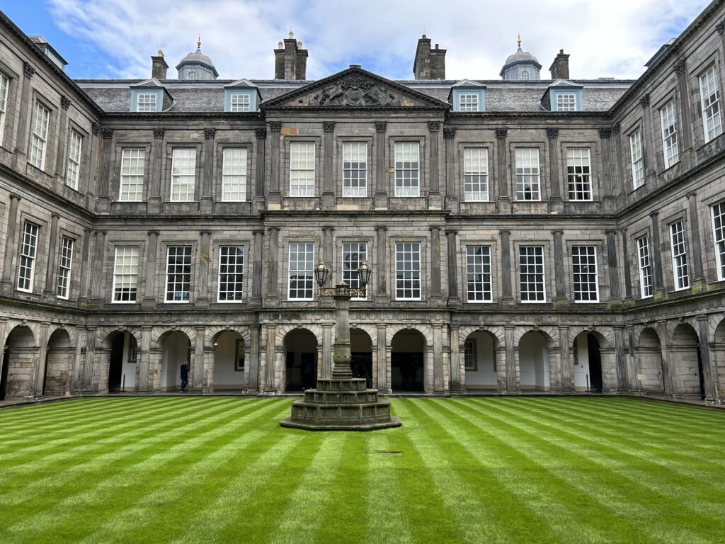 The historic Holyrood Palace courtyard featured in our Edinburgh travel guide.