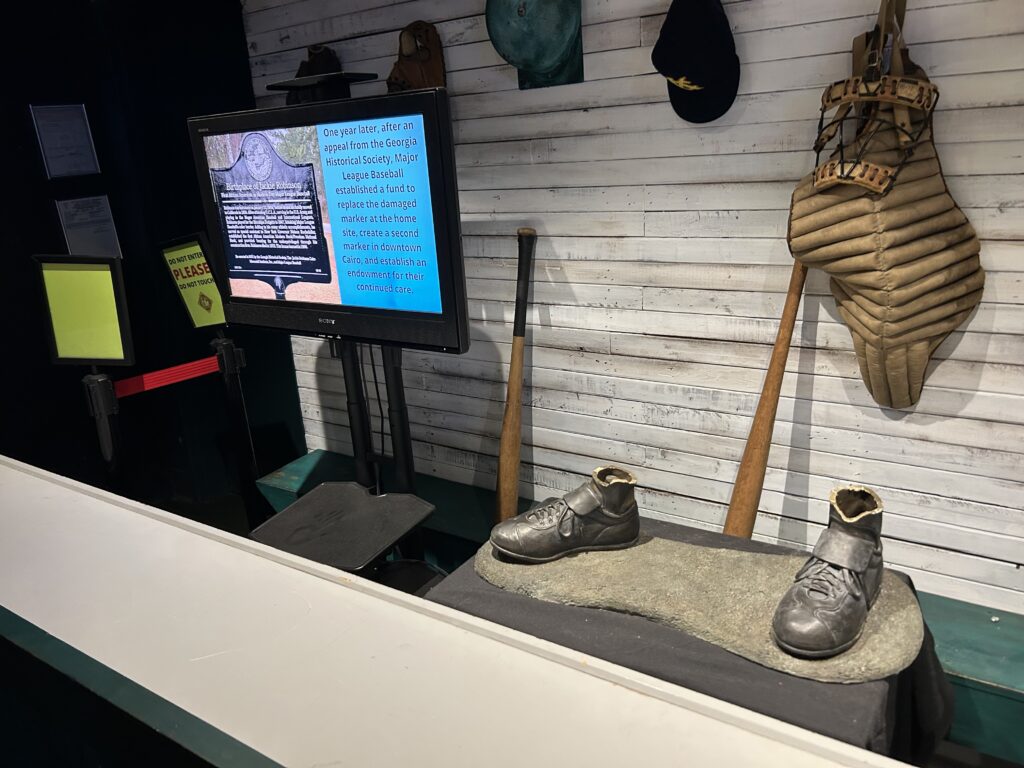 Jackie Robinson played a few years in the Negro League before signing with the Brooklyn Dodgers. The exhibit on Jackie tells the story of the hatred he faced. That includes a base of a statue that was sawed off at its base as recently as 2024. Jackie Robinson played a few years in the Negro League before signing with the Brooklyn Dodgers. The exhibit on Jackie tells the story of the hatred he faced. That includes a base of a statue that was sawed off at its base as recently as 2024.