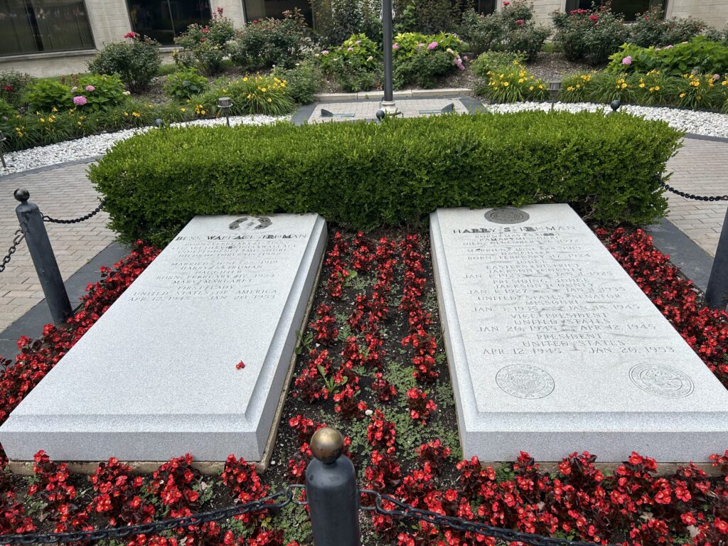 In the courtyard at the Truman Library are the graves for President Truman and First Lady Bess. In the courtyard at the Truman Library are the graves for President Truman and First Lady Bess.