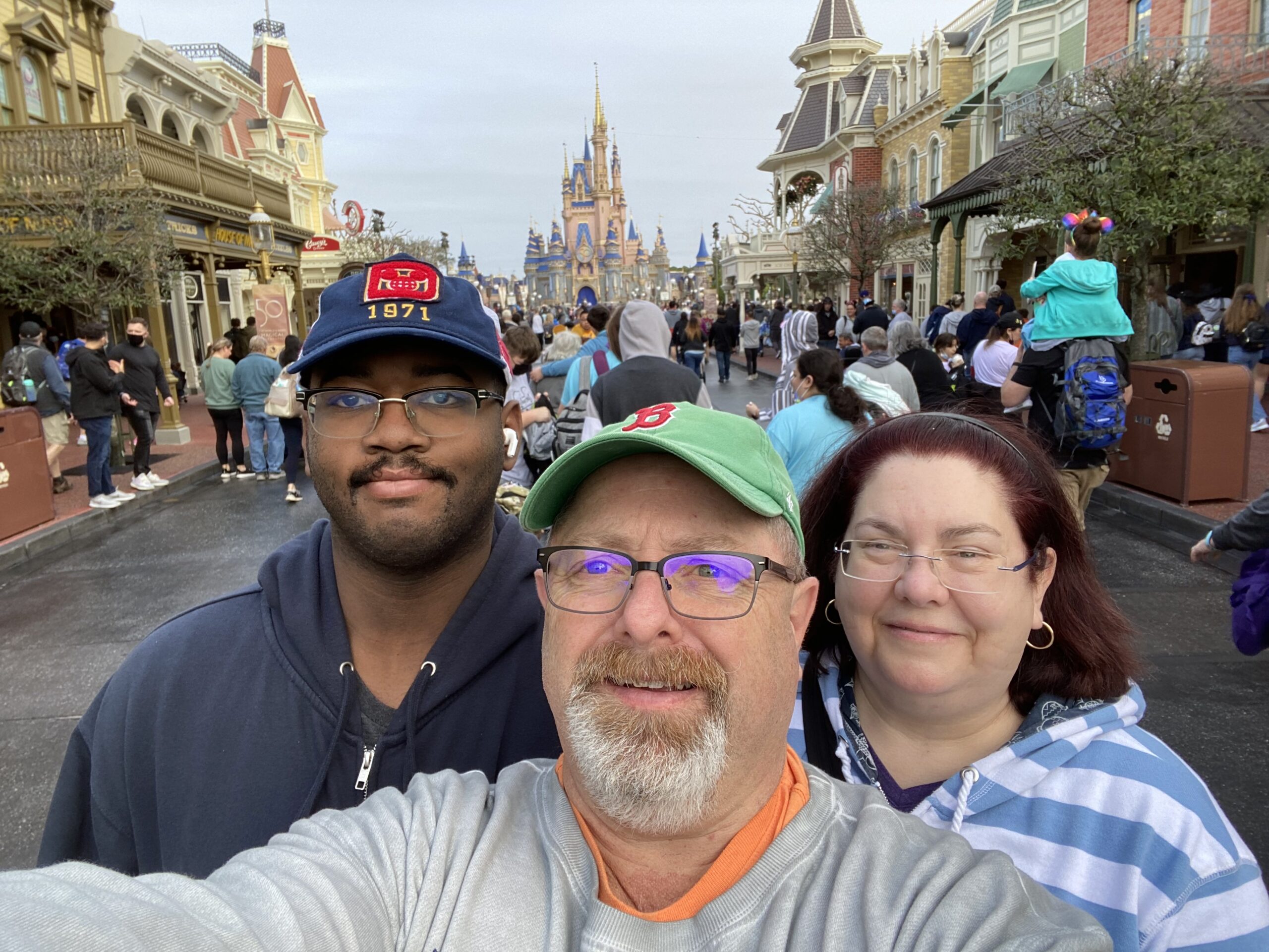 Florida travel guide family photo on Main Street USA at Disney World in Orlando Florida