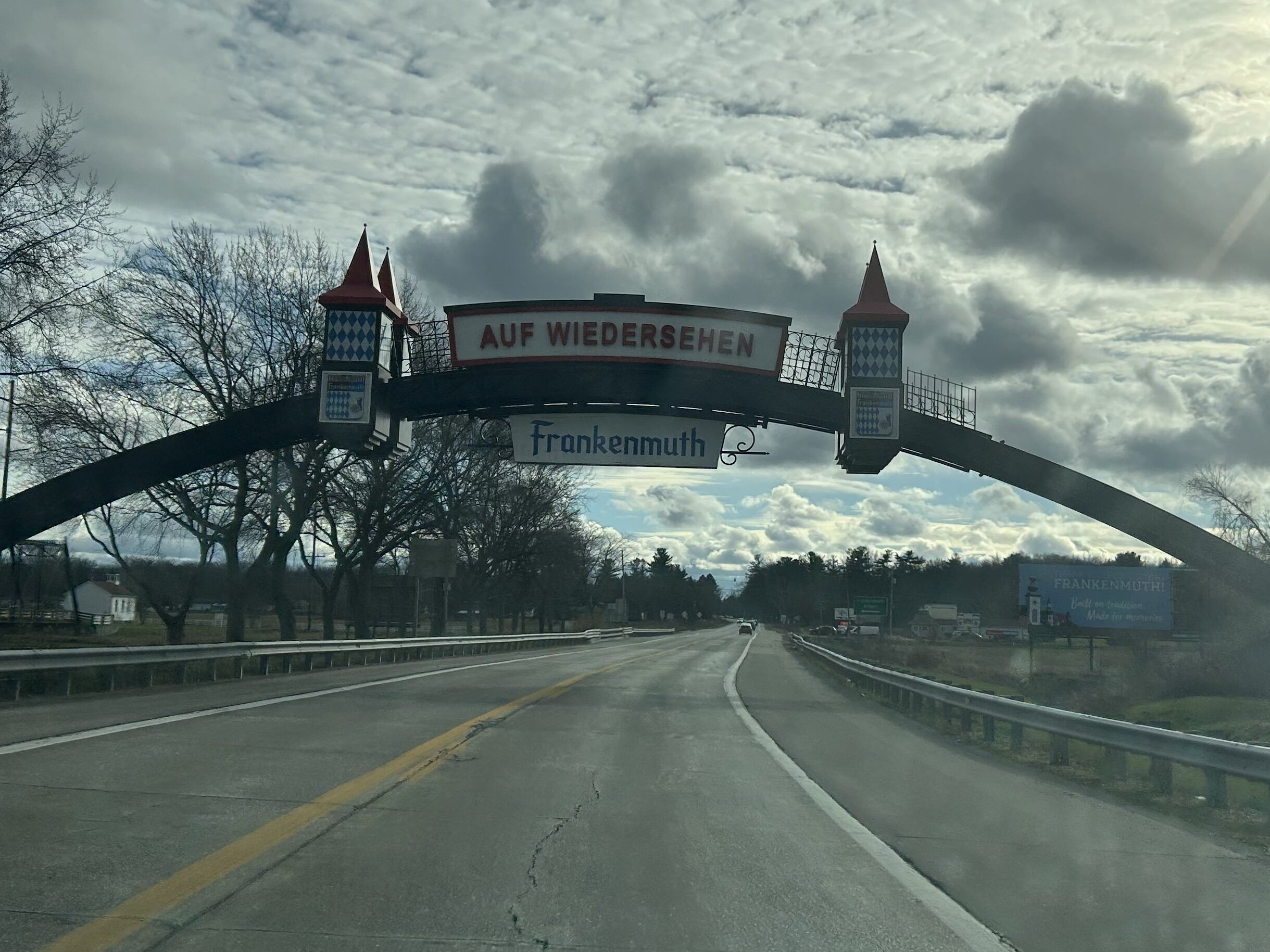 Welcome sign to Frankenmuth in German greets visitors to this village North of Detroit, Michigan. The German welcome arch greeting visitors to a festive Frankenmuth Michigan Christmas vacation.