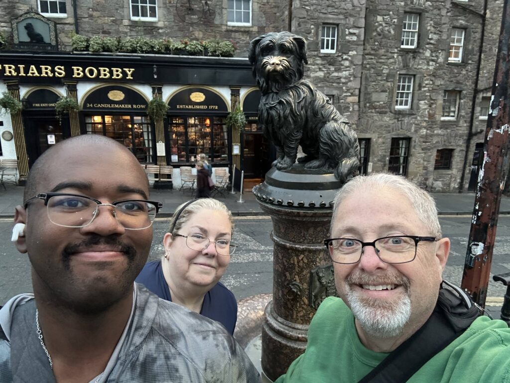The famous statue of Greyfriars Bobby in Edinburgh, a landmark featured in our first time European travel tips for being a respectful visitor.