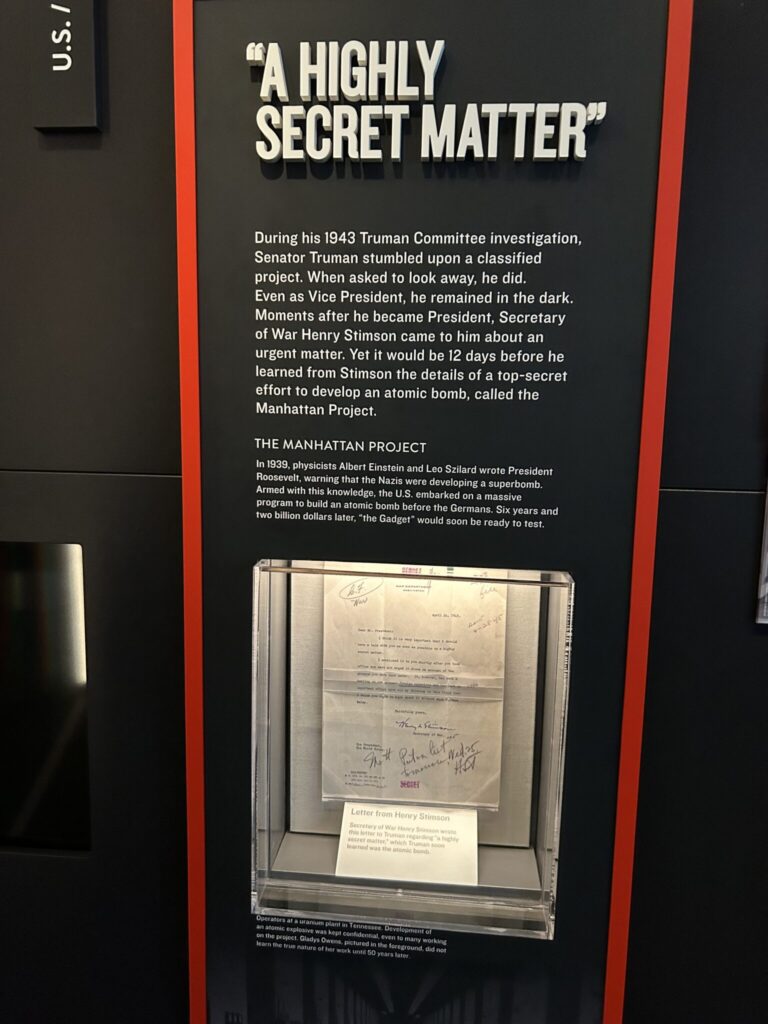 Classified documents related to the Manhattan Project on display at the Harry S. Truman Library, a highlight for those following our presidential library travel tips.