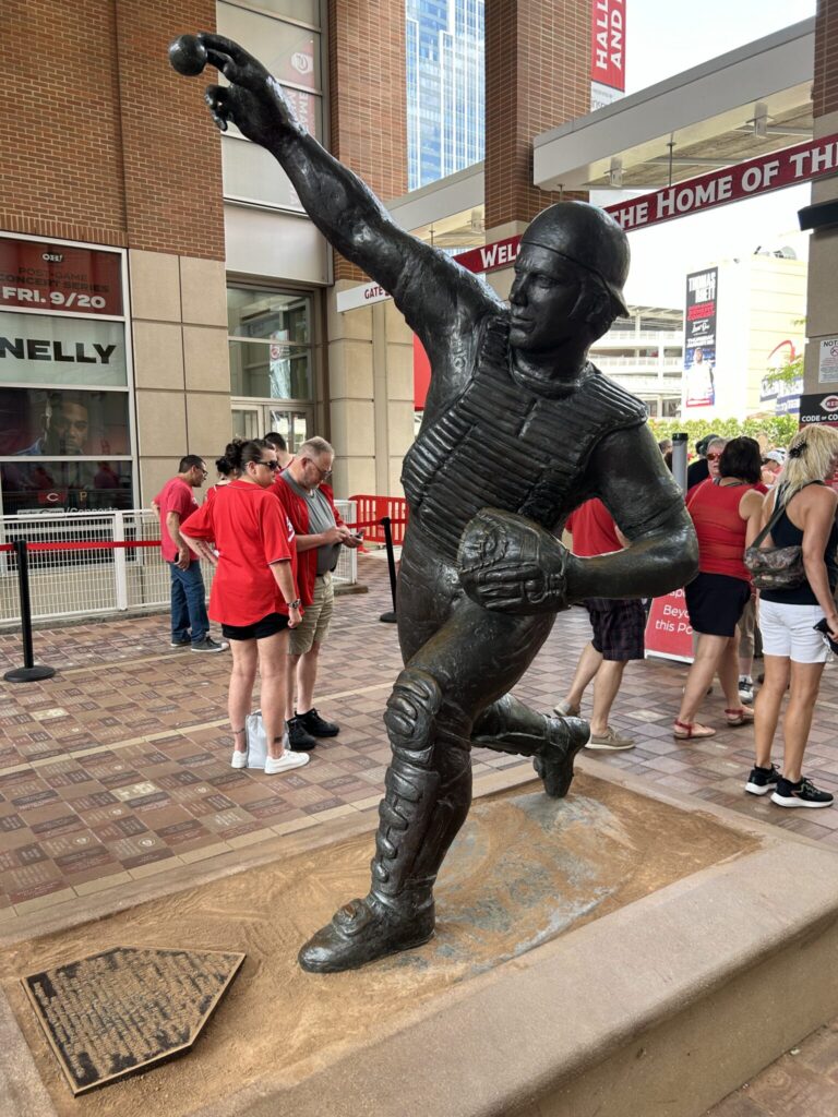 The bronze Johnny Bench statue in a throwing action pose outside the entrance of Great American Ball Park in Cincinnati, Ohio.