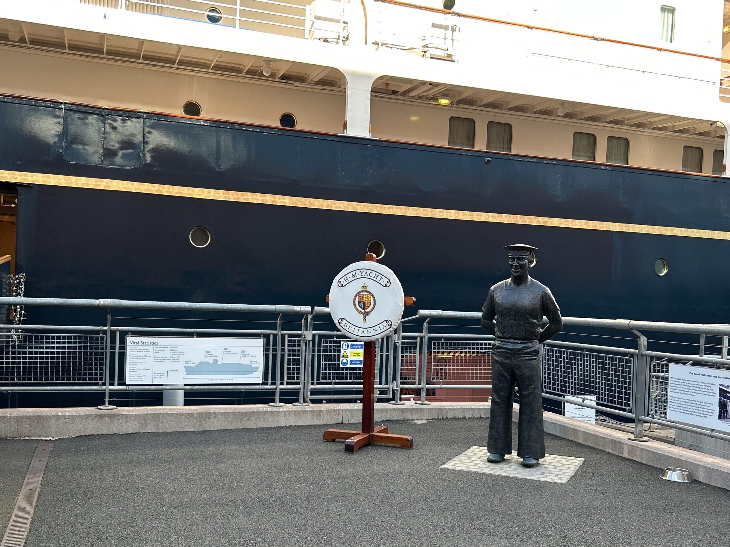 A side view of HMS Britannia, and a great spot for a photo. It also provides you a view to see how large this ship is. A majestic side view of HMS Britannia, highlighting the scale of this premier Royal Yacht Britannia Edinburgh historic gem attraction.