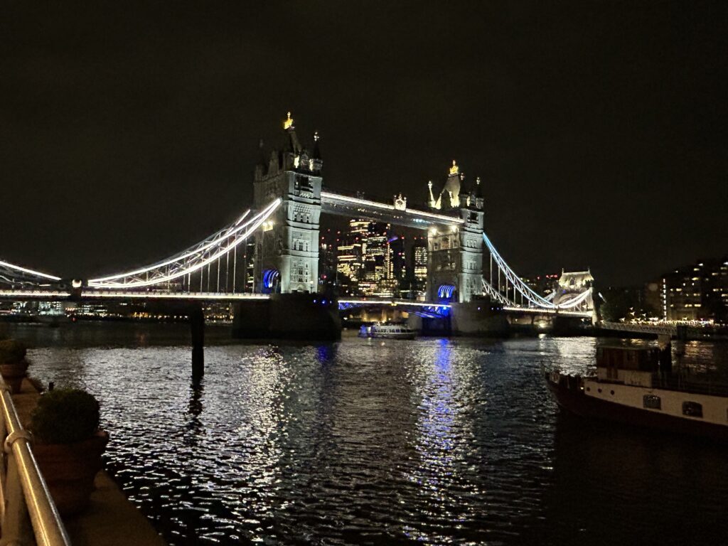 Tower Bridge London England at sunset reflecting on the Thames River