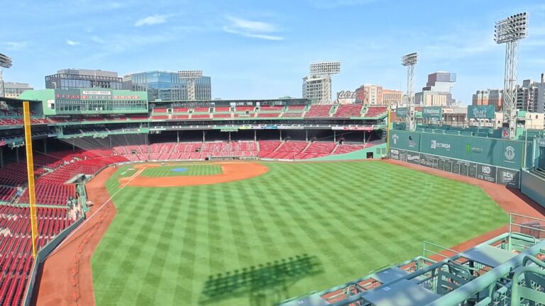 A sweeping view of the empty baseball field and stadium seats taken during our morning Fenway Park tour in Boston.