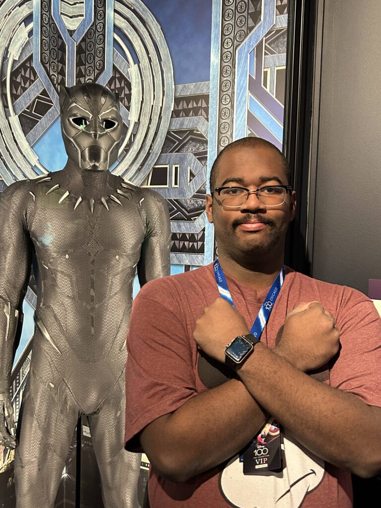 eric at disney 100 years celebration black panther costume exhibit chicago