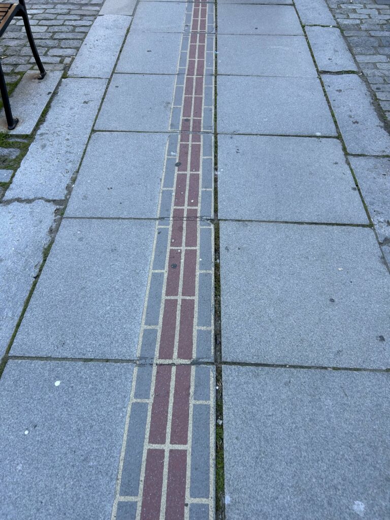 walking the boston freedom trail red brick path in downtown boston